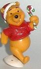 Winnie the Pooh - Weihnachten - Pooh mit Zuckerstange - zum Schließen ins Bild klicken