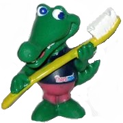Theramed - Kroko mit Zahnbürste - zum Schließen ins Bild klicken